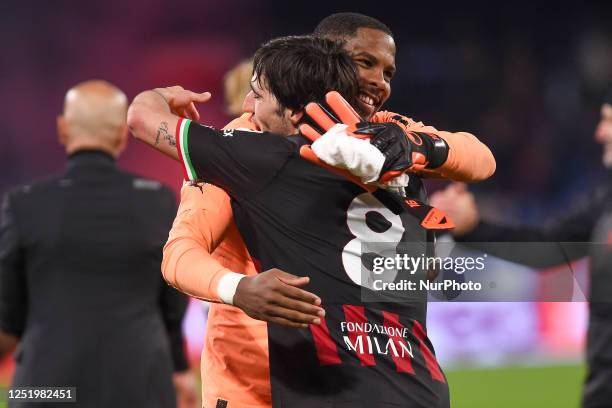 Mike Maignan and Sandro Tonali of AC Milan celebrate at the end of the UEFA Champions League match between SSC Napoli and AC Milan at Stadio Diego...