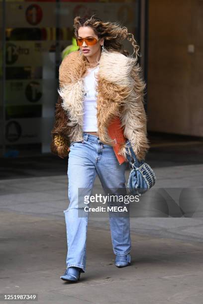 Rita Ora is seen arriving at Radio 1 on April 19, 2023 in London, United Kingdom.