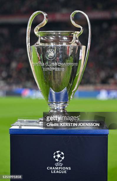 The Champions League trophy is pictured prior to the UEFA Champions League quarter-final, second leg football match between Bayern Munich and...