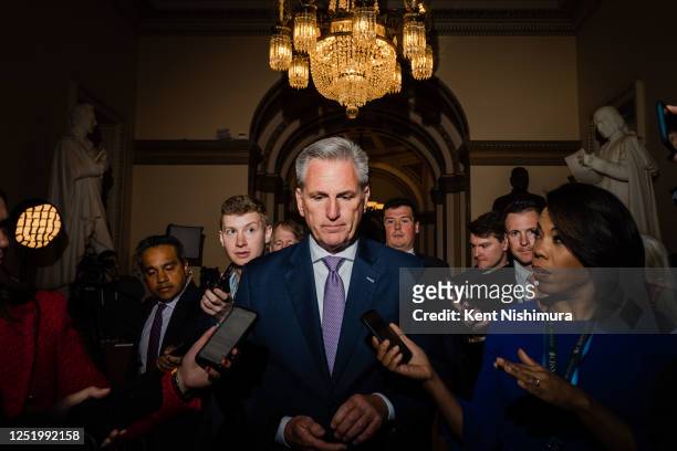 Speaker of the House Kevin McCarthy is surrounded by reporters after he leaves the House Floor to return to his office at the U.S. Capitol on...