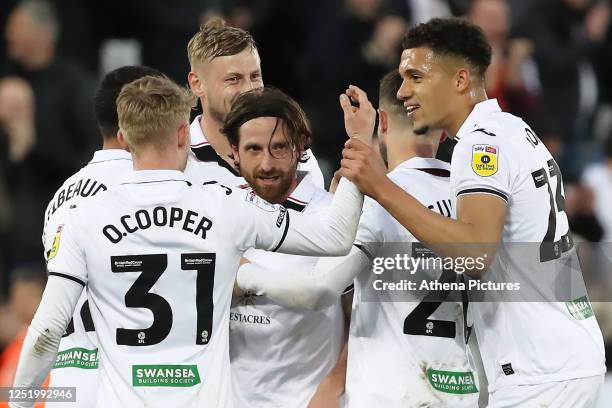 Joe Allen of Swansea City celebrates his goal with team mates during the Sky Bet Championship match between Swansea City and Preston North End at the...