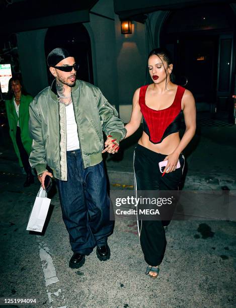 Rauw Alejandro and Rosalía are seen leaving Craig's on April 18, 2023 in Los Angeles, California.