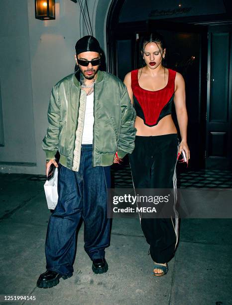 Rauw Alejandro and Rosalía are seen leaving Craig's on April 18, 2023 in Los Angeles, California.