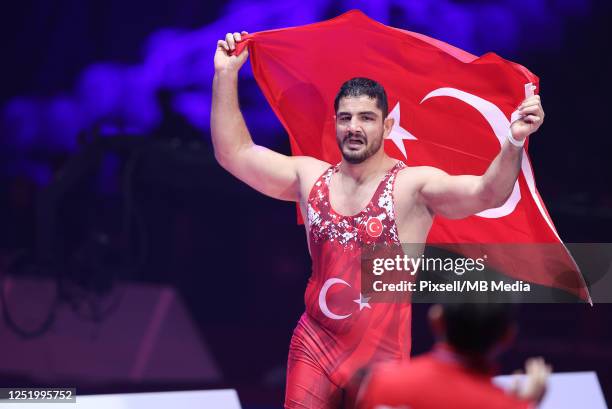 Taha Akgul of Turkey celebrates after winning against Geno Petriashvili of Georgia during Men's Freestyle 125 kg weight Senior European Wrestling...