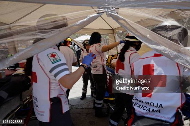 Members of the Mexican Red Cross attended to people who were supposedly intoxicated during the First National Drill 2023 in Mexico, on april 19 where...