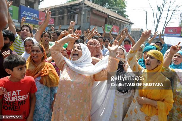 Kashmiri women shout pro-freedom slogans during an anti Indian protest in Srinagar on August 19, 2010.Twenty people were hurt Thursday in fresh...