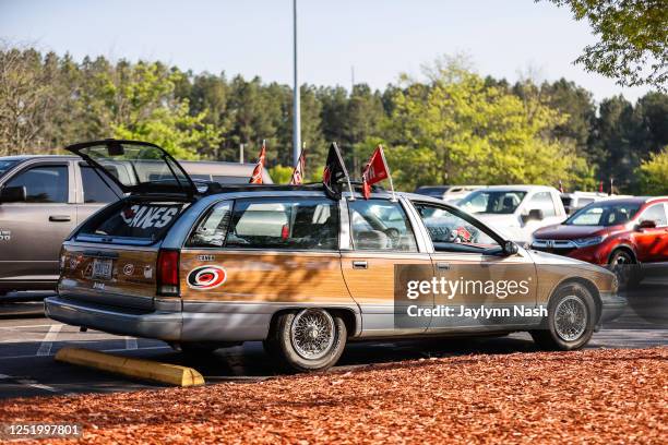 Fans tailgate and decorate their cars as the Carolina Hurricanes prepare to take on the New York Islanders prior to the start of Eastern Conference...