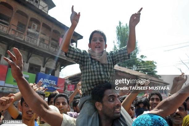 Kashmiri protestors shout pro-freedom slogans during an anti Indian protests in Srinagar on August 19, 2010. Twenty people were hurt today in fresh...