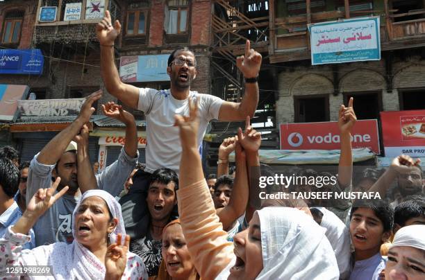 Kashmiri protestors shout pro-freedom slogans during an anti Indian protest in Srinagar on August 19, 2010.Twenty people were hurt Thursday in fresh...