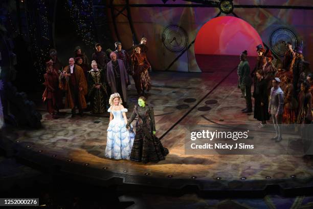 Lucy St. Louis and Alexia Khadime take a bow with the rest of the cast of "Wicked" at the "Wicked" 2023 Media Night at Apollo Victoria Theatre on...