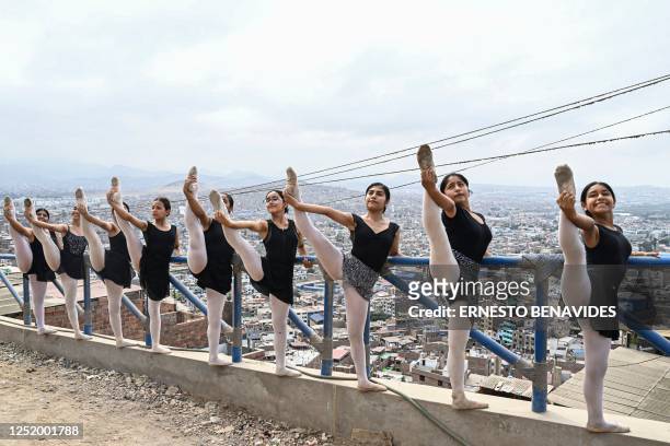 Ballet students perform at the San Genaro neighborhood in the Chorrillos district, south of Lima, on April 1, 2023. - At an arid and dry hill in...