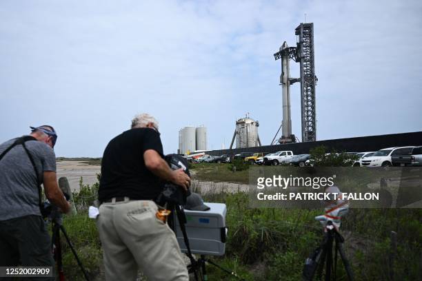 Photographers set up remote cameras to photograph the SpaceX Starship ahead of the scheduled launch from the SpaceX Starbase in Boca Chica, Texas on...
