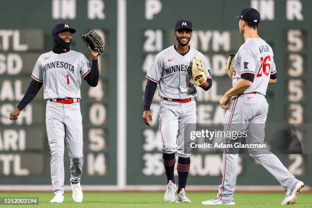 Nick Gordon, Michael A. Taylor and Max Kepler of the Minnesota Twins react after a victory over the Boston Red Sox at Fenway Park on April 19, 2023...