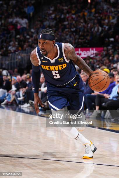 Kentavious Caldwell-Pope of the Denver Nuggets drives to the basket during Round 1 Game 2 of the 2023 NBA Playoffs against the Minnesota Timberwolves...