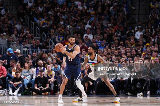 Jamal Murray of the Denver Nuggets looks to pass the ball during Round 1 Game 2 of the 2023 NBA Playoffs against the Minnesota Timberwolves on April...