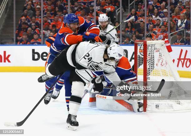 Phillip Danault of the Los Angeles Kings watches his shot go past Stuart Skinner of the Edmonton Oilers in the second period in Game Two of the First...