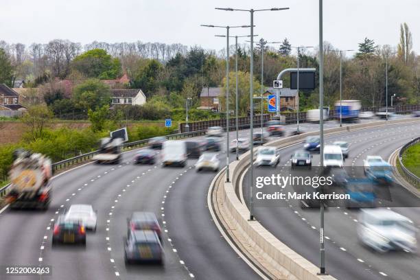 Vehicles pass along a recently completed section of the M4 smart motorway on 19 April 2023 in Slough, United Kingdom. The government has announced...