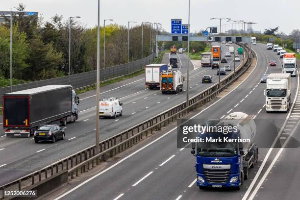 Vehicles pass along a recently completed section of the M4 smart motorway on 19 April 2023 in Slough, United Kingdom. The government has announced...