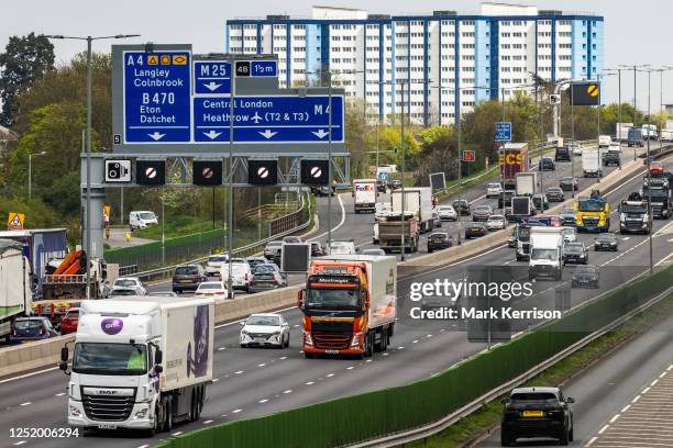 Vehicles pass along a recently completed section of the M4 smart motorway on 19 April 2023 in Slough, United Kingdom. The government has announced...