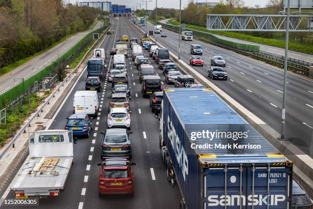 Vehicles pass along a recently completed section of the M4 smart motorway on 19 April 2023 in Slough, United Kingdom. The government has announced...