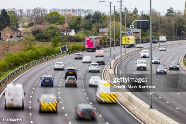 Vehicles pass along a recently completed section of the M4 smart motorway on 19 April 2023 in Slough, United Kingdom. The government has announced...