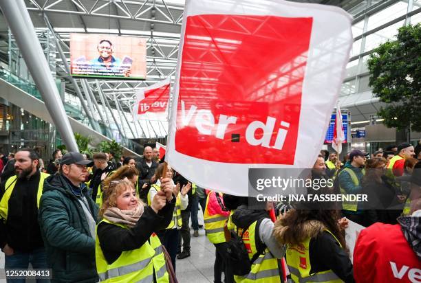 Aviation security staff organized in the public transport sector union Verdi gather for a demonstration during a strike at the airport of...