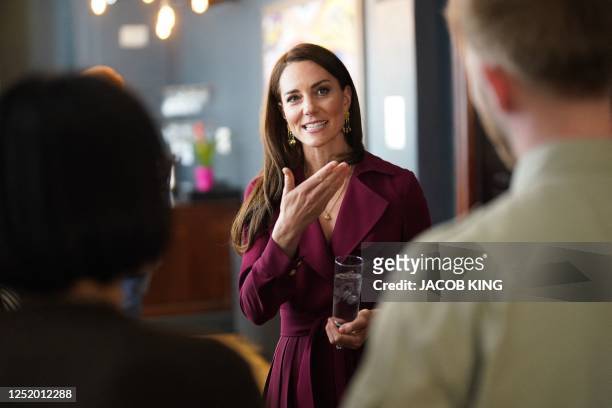 Britain's Catherine, Princess of Wales smiles during a visit to The Rectory in Birmingham on April 20 where she met future leaders and local business...