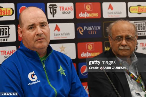 Pakistan's former head coach Mickey Arthur and Pakistan Cricket Board's management committee chairman Najam Sethi attend a press conference at the...
