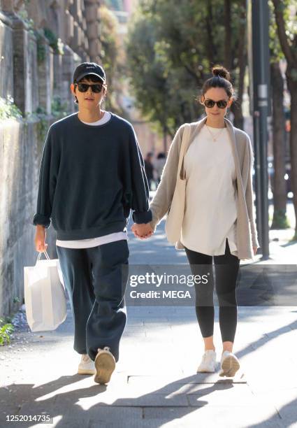 Song Joong-ki and Katy Saunders are seen on April 19, 2023 in Rome, Italy.