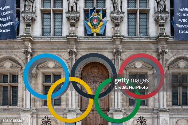 Photo of the Olympic rings of Paris 2024 as a few hundred demonstrators gathered on the esplanade of the Hotel de Ville de Paris on April 20, 2023 at...