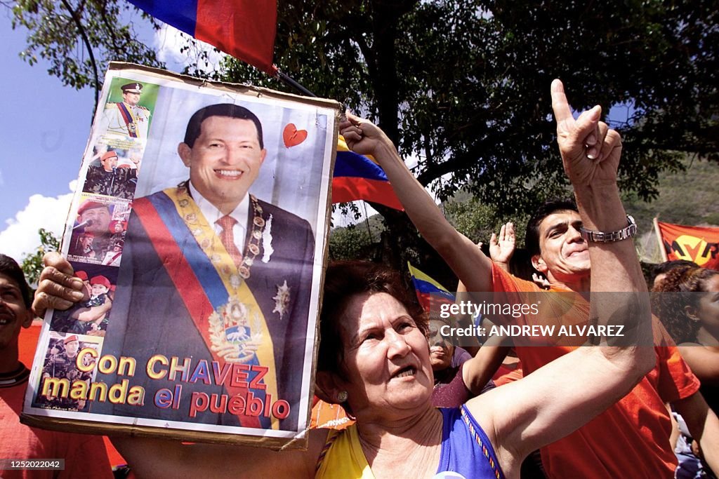 Hugo Ch A supporter of Venezuelan President Hugo Chávez chants slogans as she ...