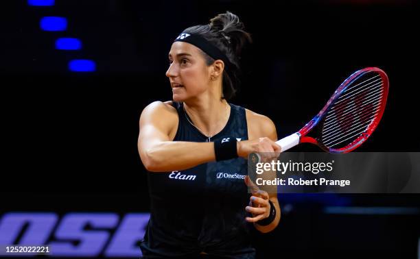 Caroline Garcia of France in action against Tatjana Maria of Germany in the second round of the Porsche Tennis Grand Prix Stuttgart 2023 at Porsche...