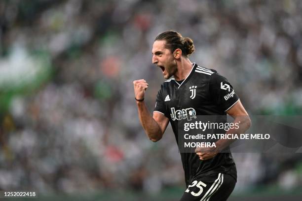 Juventus' French midfielder Adrien Rabiot celebrates scoring his team's first goal during the UEFA Europa league quarter final second leg football...