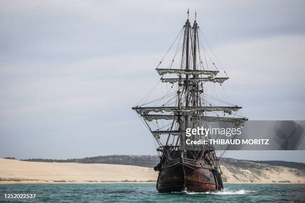 The replica of a 17th century Spanish galleon, El Galeon Andalucia, passes in front of the Pyla Dunes as it arrives for a boat show in the Arcachon...