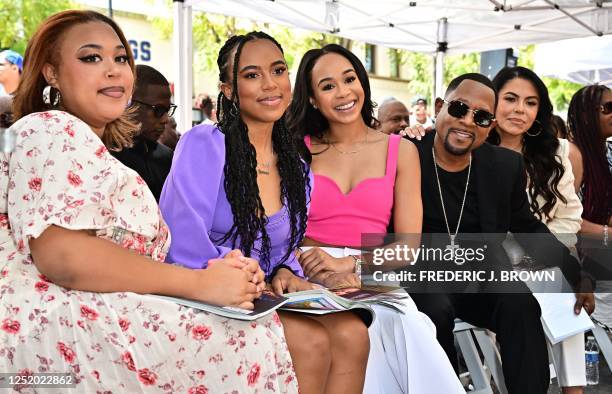 Actor Martin Lawrence and his daughters Amara Trinity Lawrence , Iyanna Faith Lawrence , Jasmine Page Lawrence and girlfriend Angie Gonzales attend...