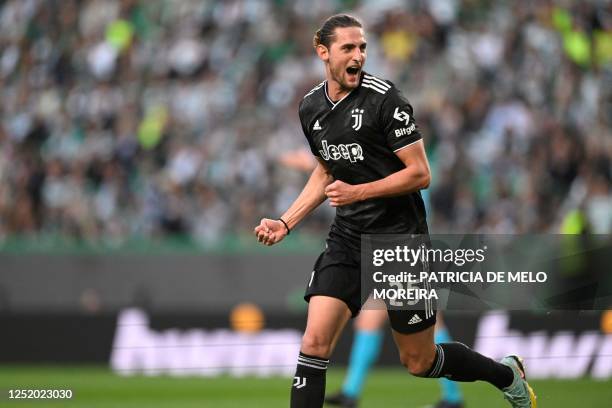 Juventus' French midfielder Adrien Rabiot celebrates scoring his team's first goal during the UEFA Europa league quarter final second leg football...