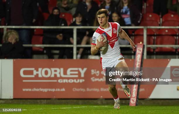 St Helens Saints' Jon Bennison goes over for a try against Warrington Wolves, during the Betfred Super League match at the Totally Wicked Stadium, St...