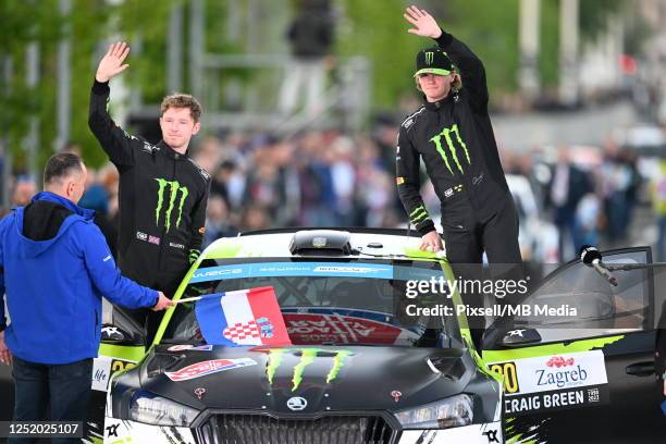 Oliver Solberg of Sweden and Elliott Edmondson of Great Britain are seen at Start Podium during WRC Croatia Ceremonial start on April 20, 2023 in...