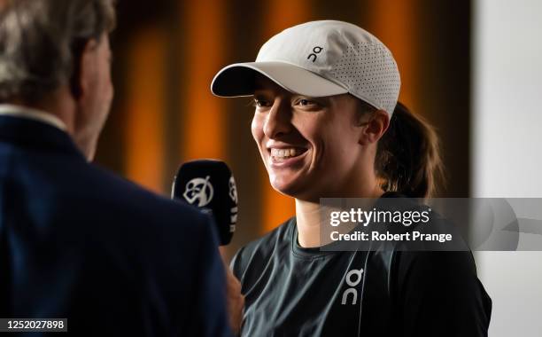 Iga Swiatek of Poland before playing against Qinwen Zheng of China in the second round of the Porsche Tennis Grand Prix Stuttgart 2023 at Porsche...