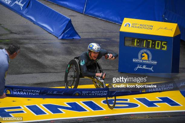Marcel Hug of Switzerland wins the men's wheelchair division of the 127th Boston Marathon on April 17, 2023 on Boylston Street in Boston, MA. Hug...