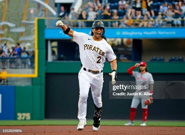 Connor Joe of the Pittsburgh Pirates reacts after hitting a three-run home run in the first inning against the Cincinnati Reds at PNC Park on April...