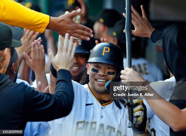 Connor Joe of the Pittsburgh Pirates reacts after hitting a three-run home run in the first inning against the Cincinnati Reds at PNC Park on April...