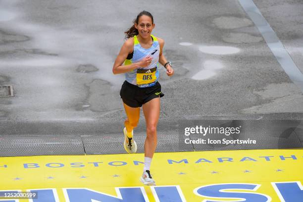 Desiree Linden of the United States crosses the finish line of the 127th Boston Marathon on April 17, 2023 on Boylston Street in Boston, MA. Linden...