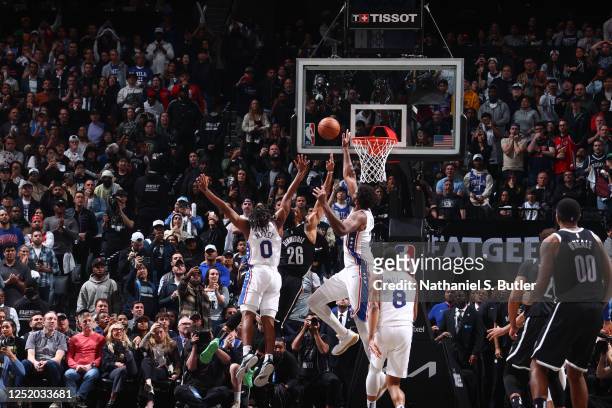 Joel Embiid of the Philadelphia 76ers blocks the shot during Round One Game Three of the 2023 NBA Playoffs against the Brooklyn Nets on April 20,...