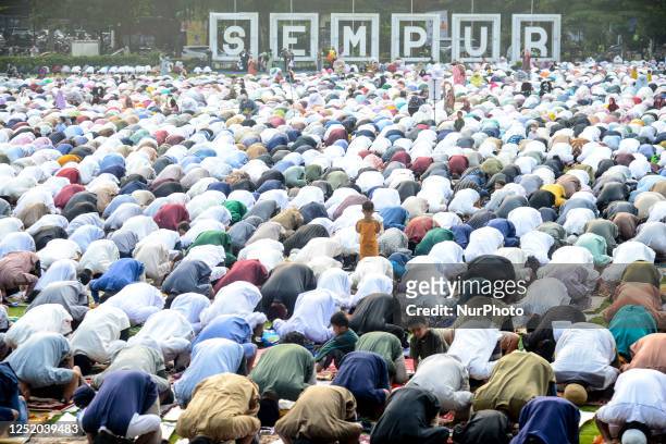 Muslims perform in a Eid prayer to celebrating Eid al-Fitr in Bogor, West Java, Indonesia on April 21, 2023. Eid al-Fitr is a religious holiday...