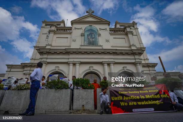 People gather in front of St. Anthony's Shrine in Kochchikade for justice for the 2019 Easter bombing victims on April 21 in Colombo,Sri Lanka. A...