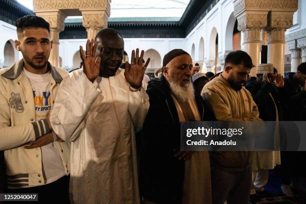 Muslims gather to perform the Eid al-Fitr prayer at La Grande Mosquee de Paris, in Paris during the first day of the Eid al-Fitr, April 21, 2023. Eid...