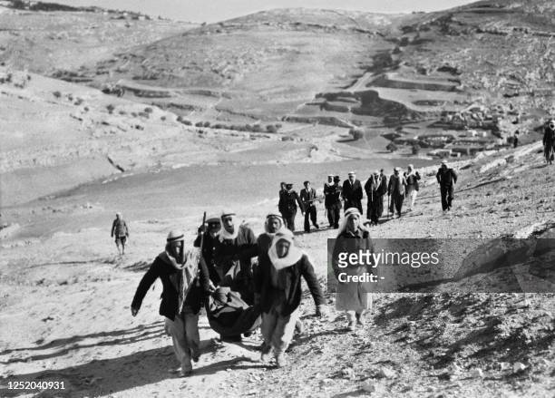 Picture released in January 1948 shows Palestinian Arabs leaving their village and neighborhoods of Jerusalem to march against a Jewish settlement in...