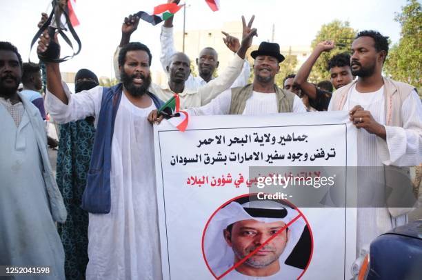 Dozens of Sudanese army supporters protest against the United Arab Emirates' influence in internal Sudanese politics in Port Sudan on April 20, 2023....