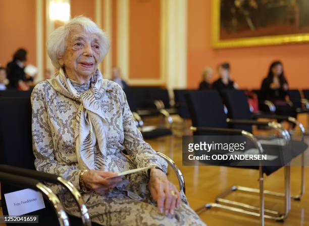 German Holocaust survivor Margot Friedlaender sits before the start of a ceremony awarding Argentine-born pianist and conductor Daniel Barenboim with...